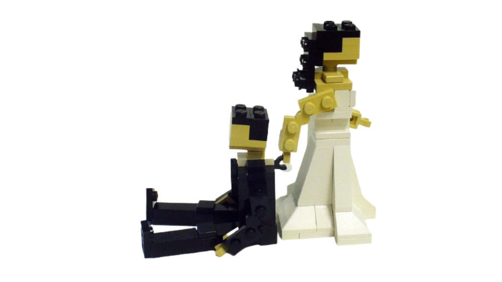 LEGO Bride Dragging Groom Cake Topper