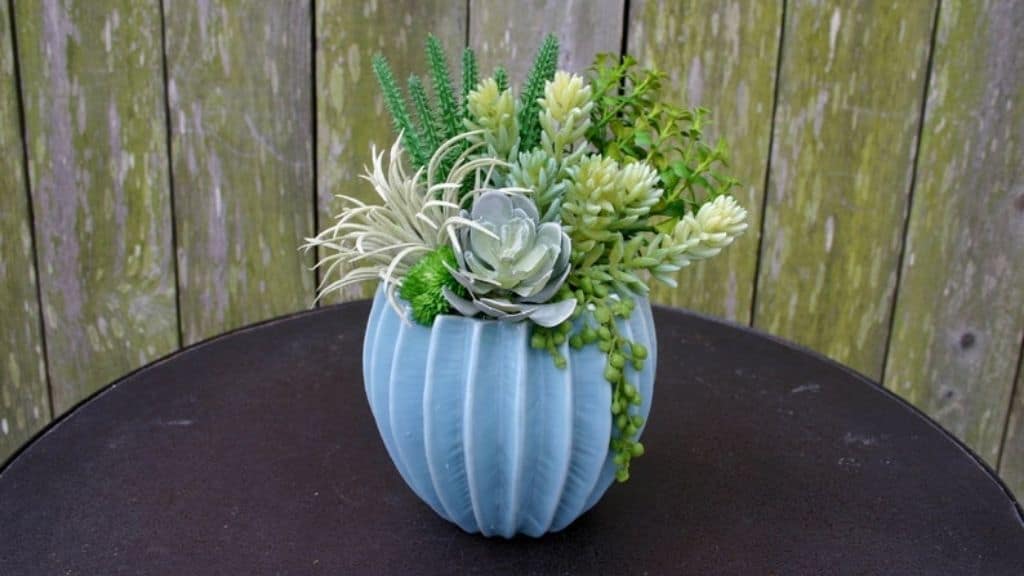 Faux Succulent Arrangement in Blue Ceramic Pot