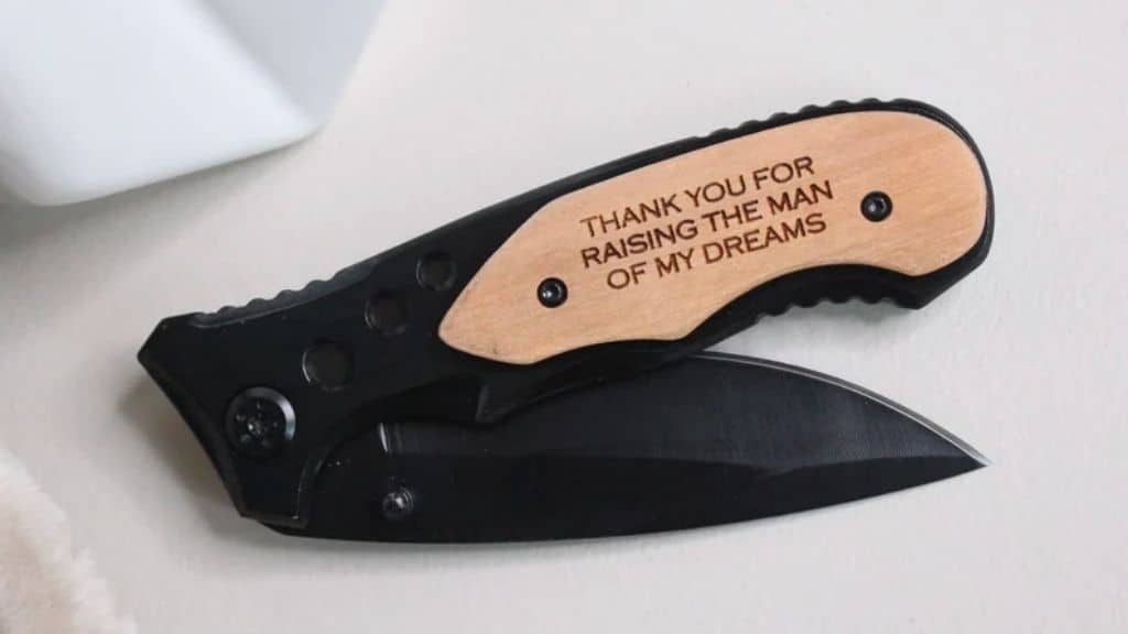 Folding Knife with Engraved Wooden Handle
