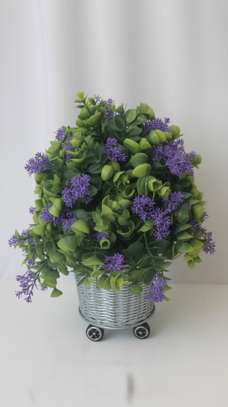 a decorative artificial topiary arrangem 7JvuTdLtSjm rs1qJq