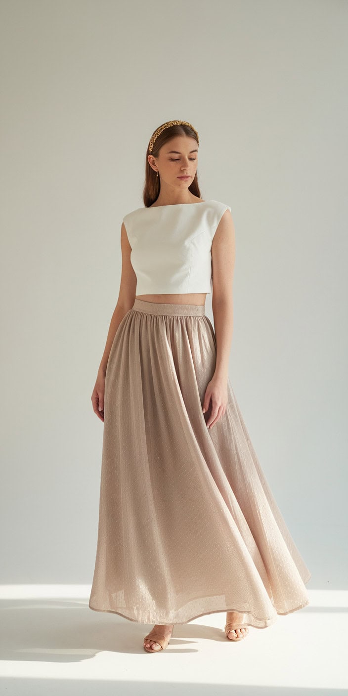 a woman dressed in a two piece outfit sh Y5H6DJm2R82BT6U84