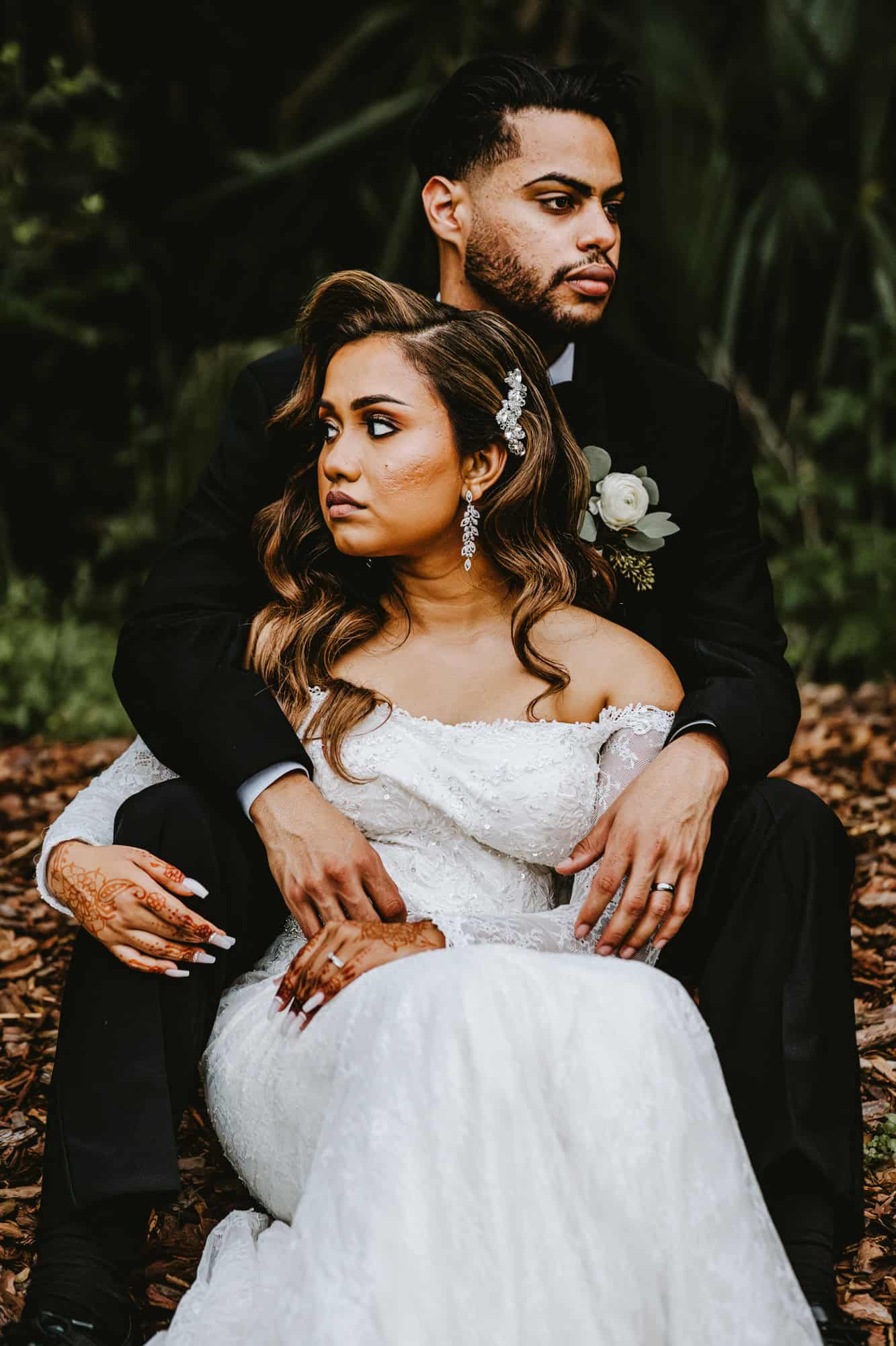 newlyweds posing for the camera