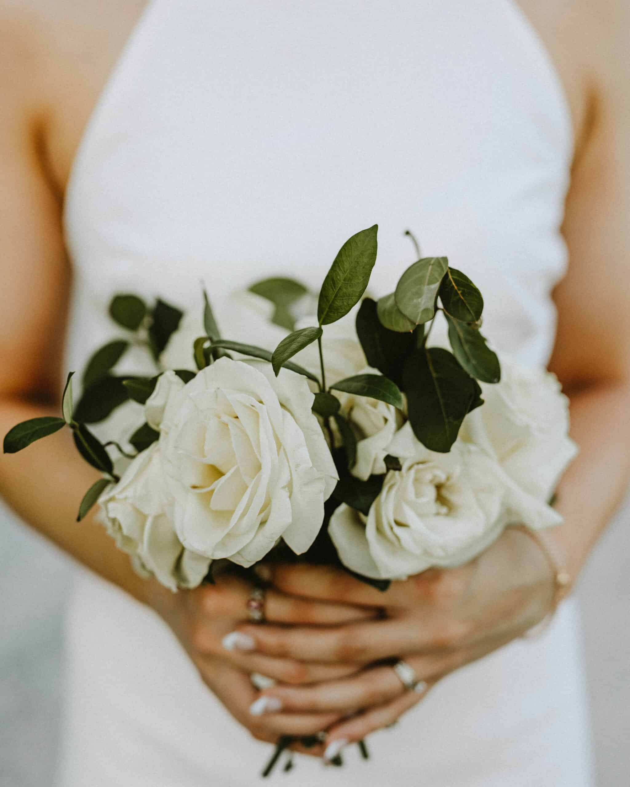 close-up of the bride holding a wedding bouquet