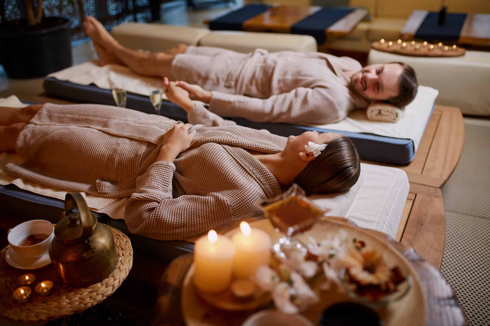 Young husband and wife relax together after spa