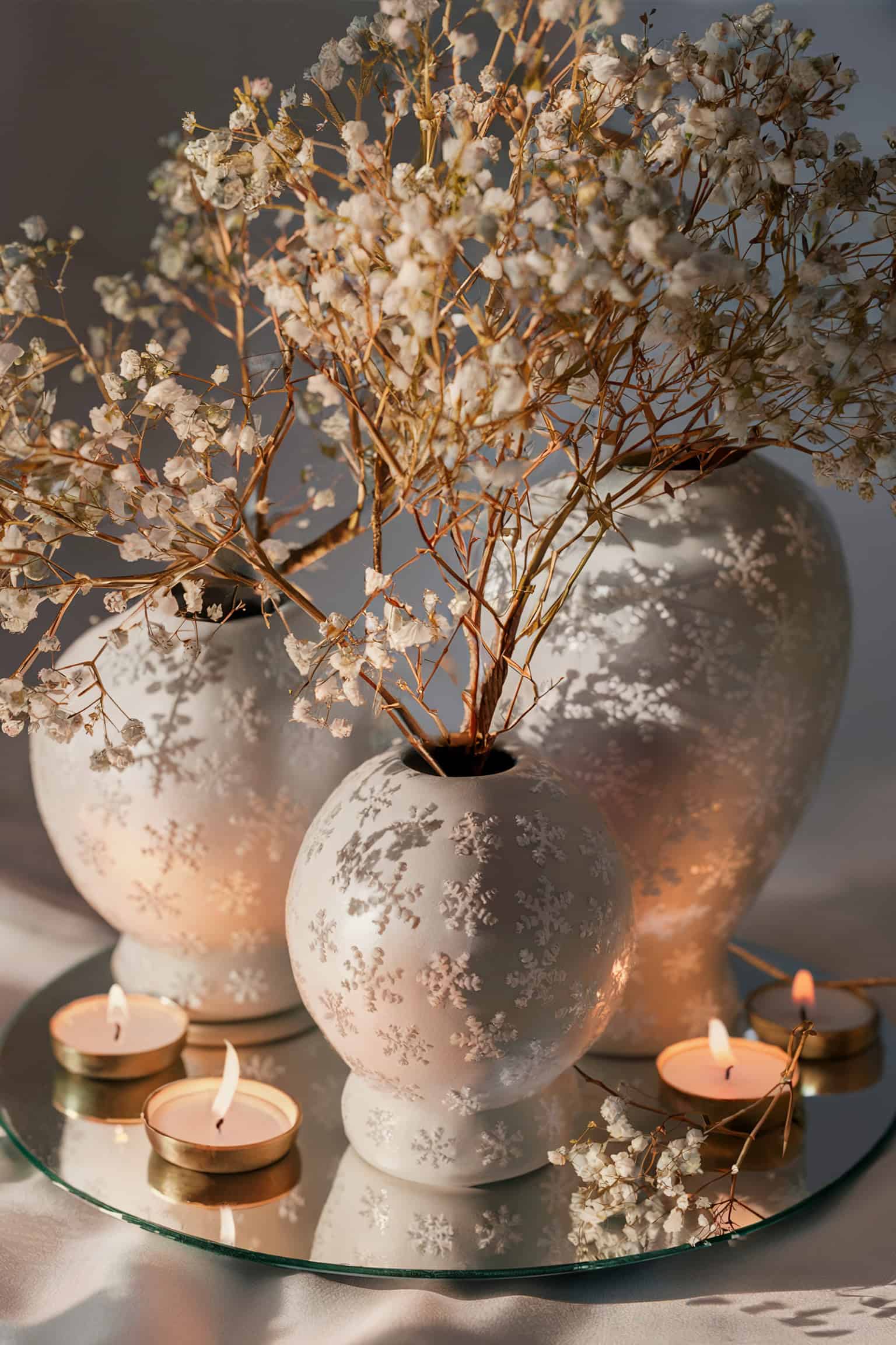 Snowflake-Adorned Vases with Baby's Breath