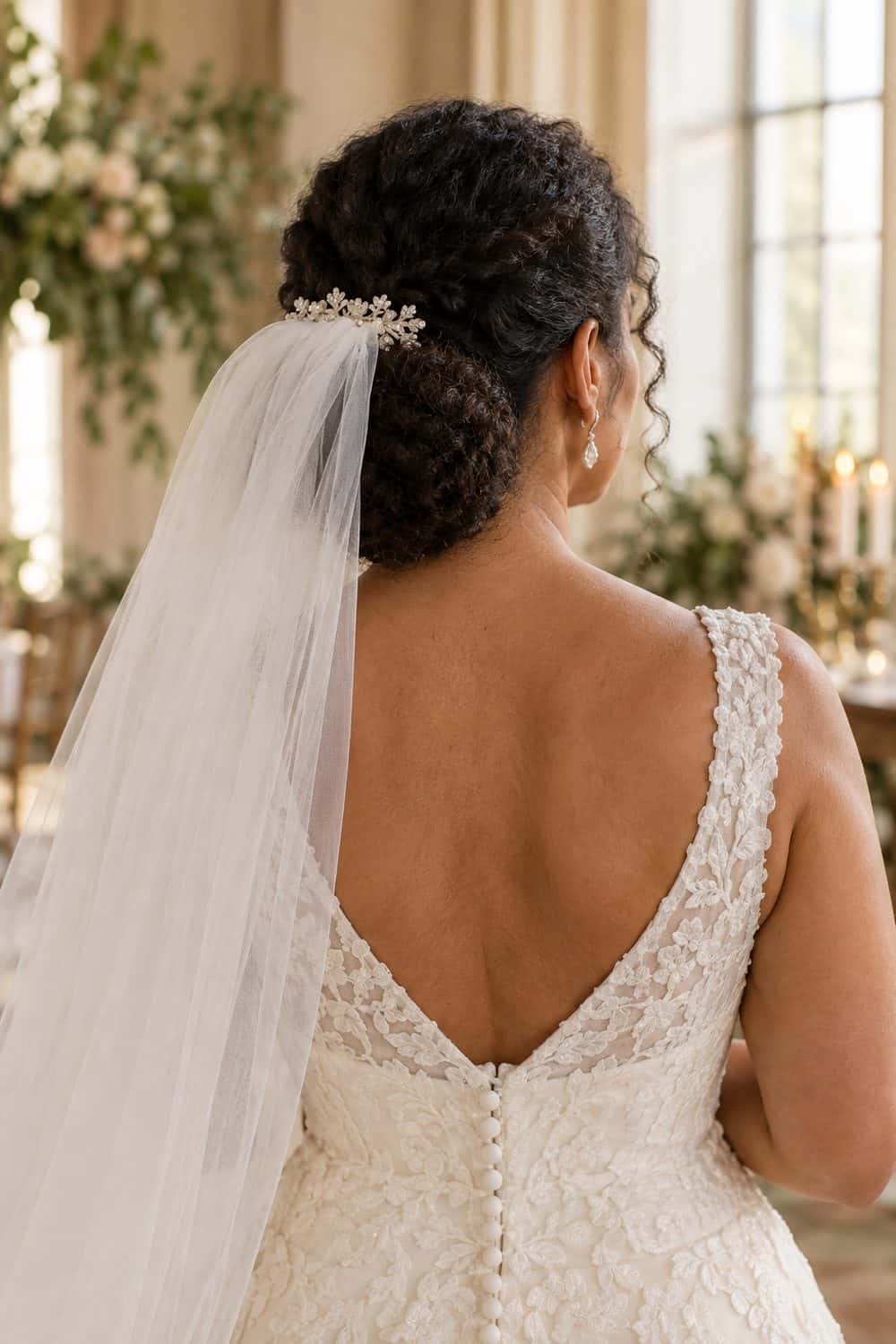 Low Coily Bun with Veil wedding inspiration